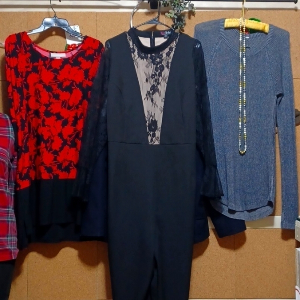 Black one piece pants suit with see thru panels front and back and sleeves